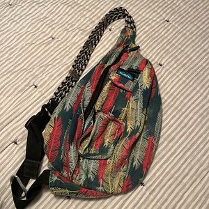 Kavu sling bag with green leaf pattern
